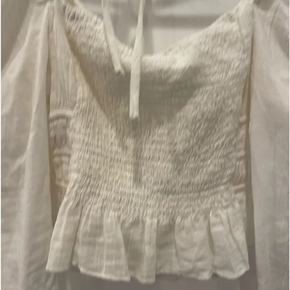 Free People Chloe puff sleeve blouse in white.Size M